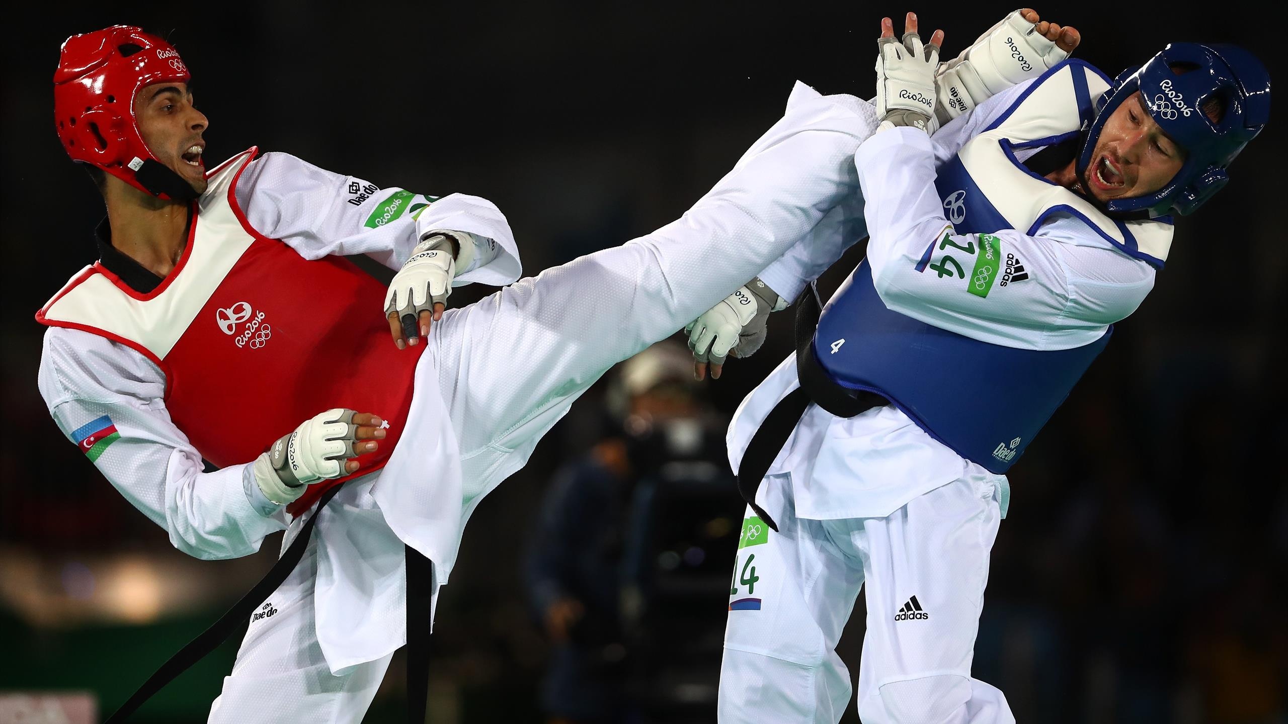 Piotr Pazinski vs Milad Beigi Harchegani, Taekwondo Wallpaper, 2560x1440 HD Desktop