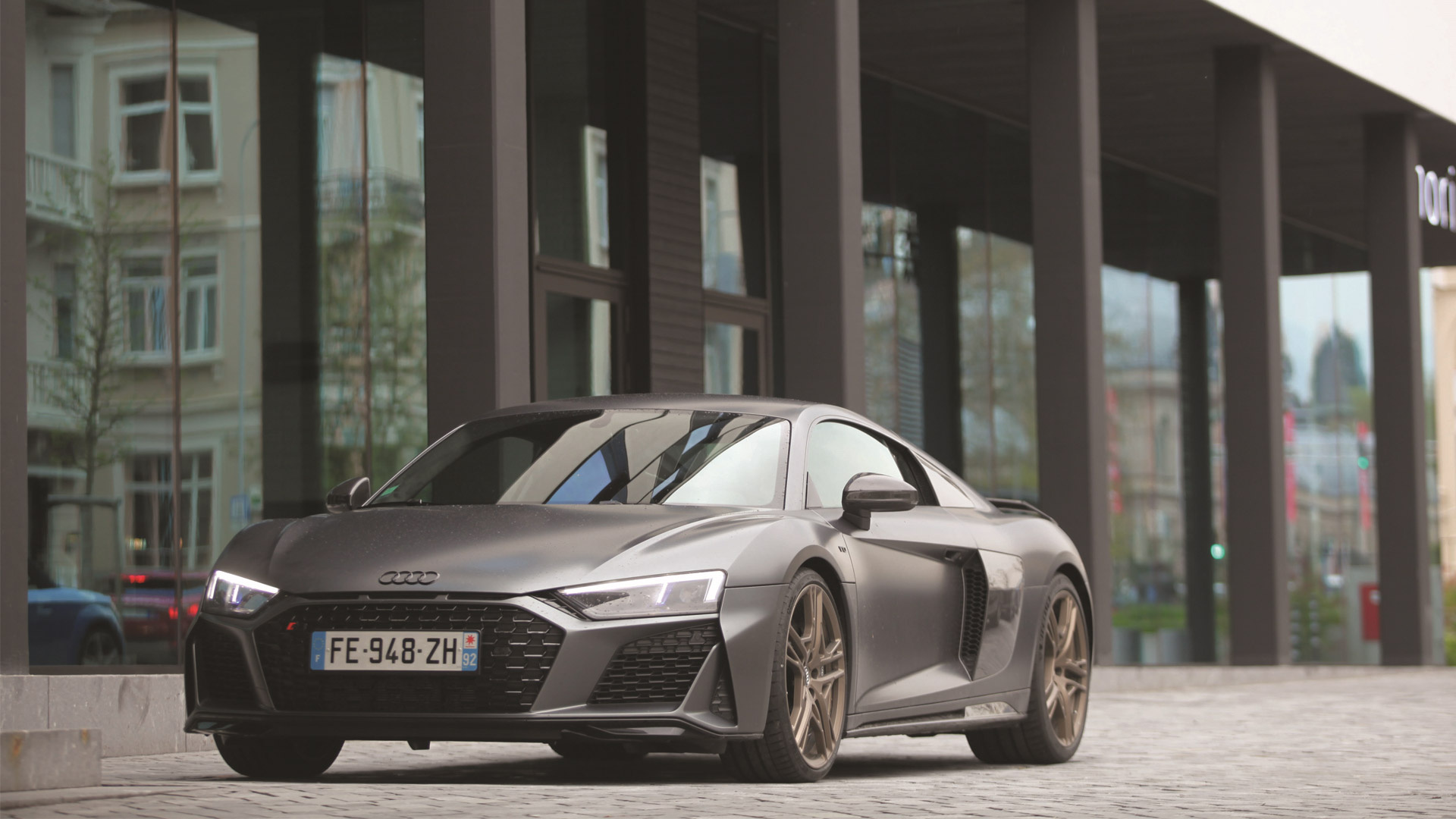 Audi R8 V10 Decennium, modern glass building facade, cobblestone paved driveway, Full HD Desktop wallpaper