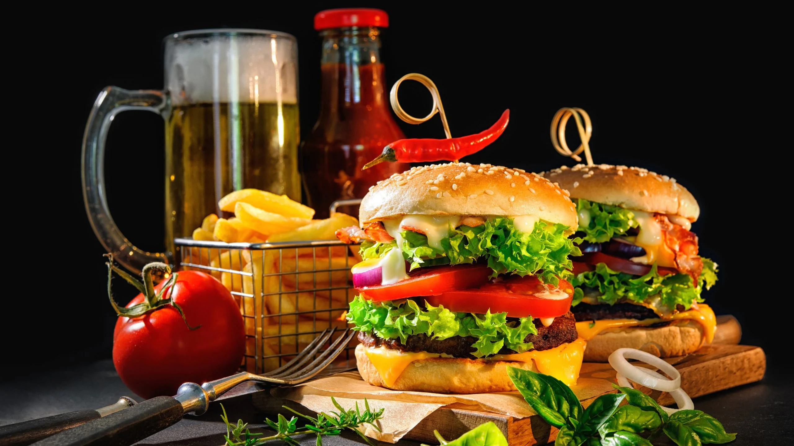 Fast food wallpaper, Junk food indulgence, Hamburger and beer, Finger-licking, 2560x1440 HD Desktop