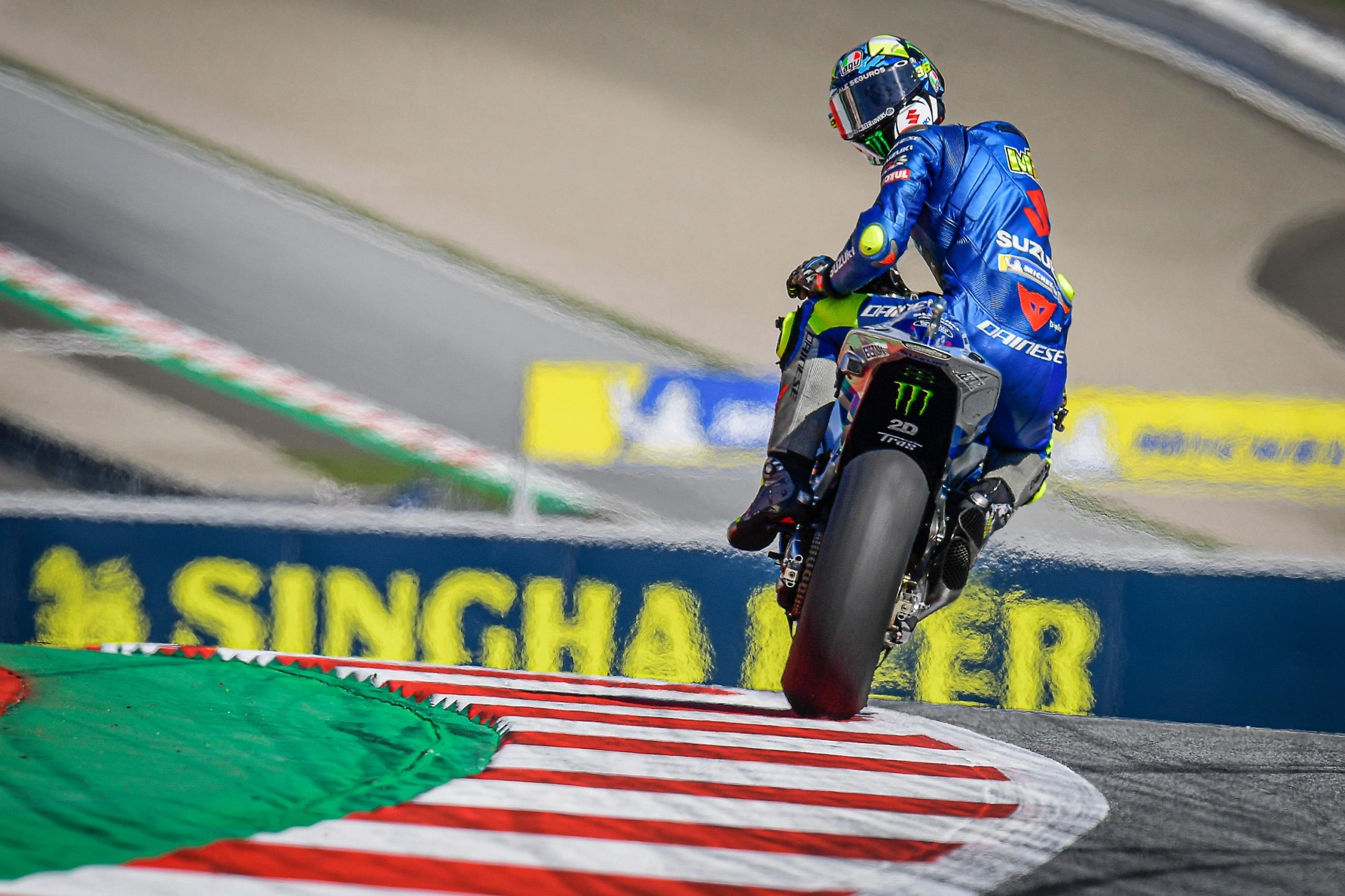 Suzuki Ecstar GSX-RR, Rear wheel lifting braking, MotoGP corner green runoff, HD Desktop wallpaper