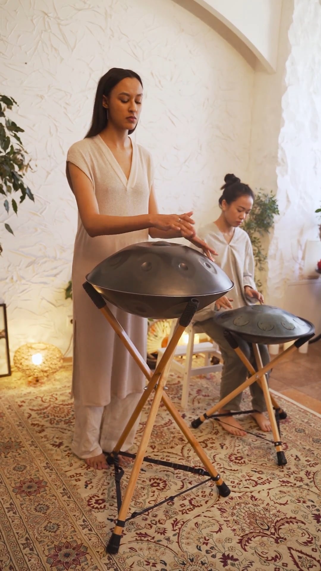 Women playing handpan drums, Free stock video, Harmony in motion, Melodic performance, 1080x1920 Full HD Phone