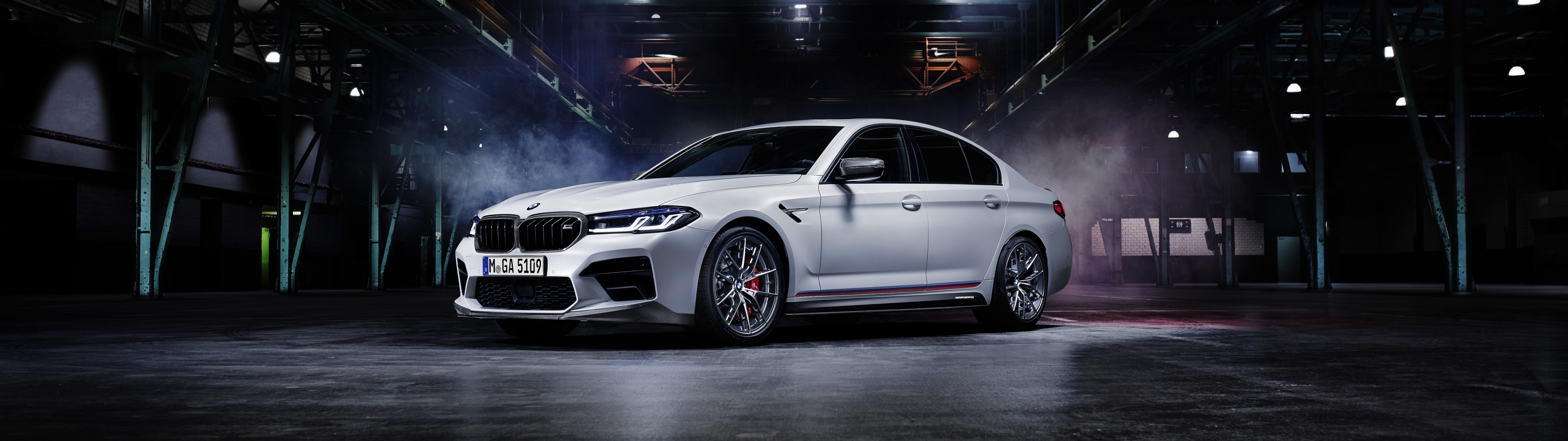 BMW M5 M Performance sedan, Industrial warehouse hangar, Atmospheric backlit smoke, Dual Screen Desktop wallpaper