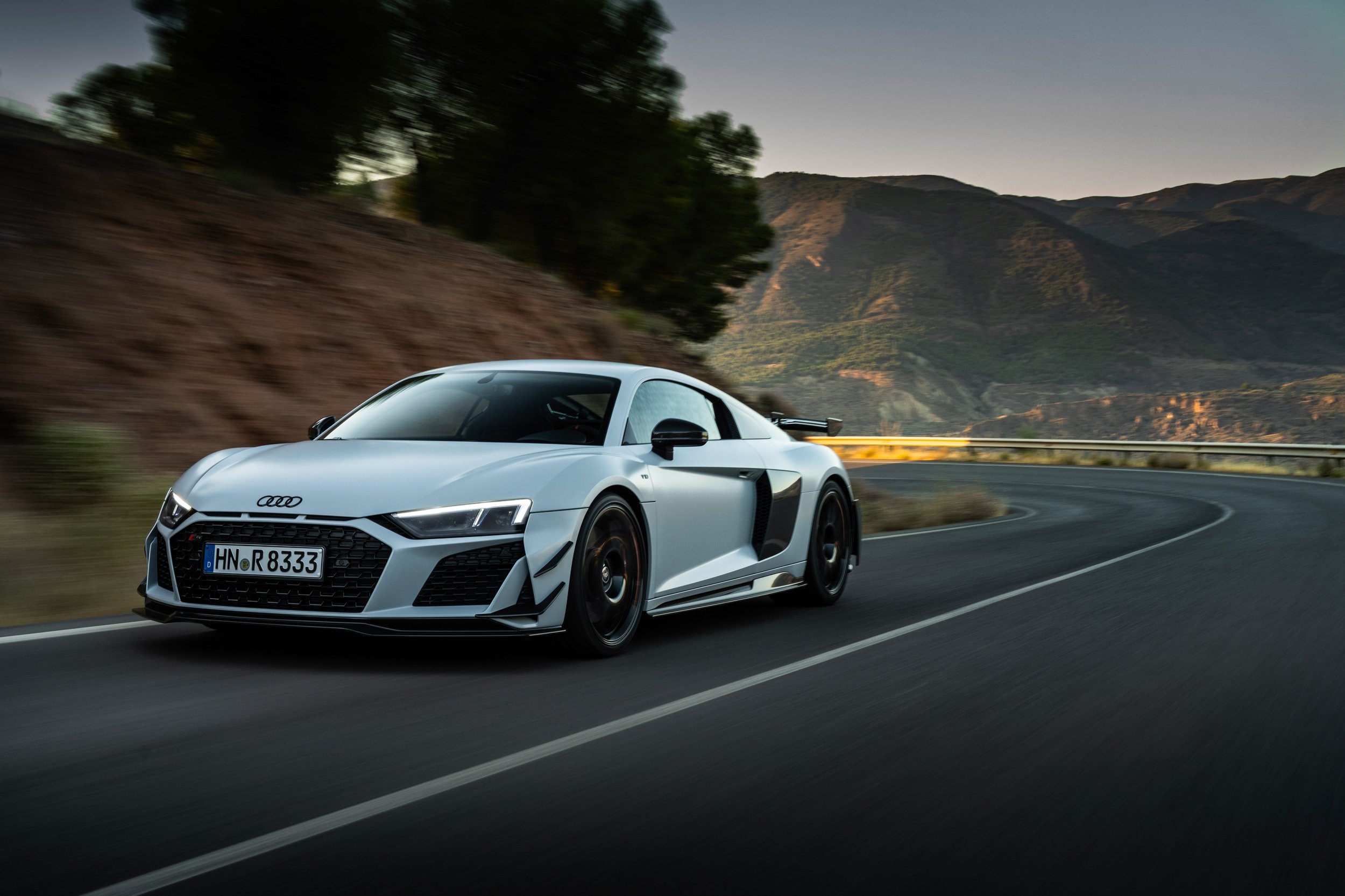 Audi R8 V10 GT RWD, winding mountain road, golden hour hillside, HD Desktop wallpaper