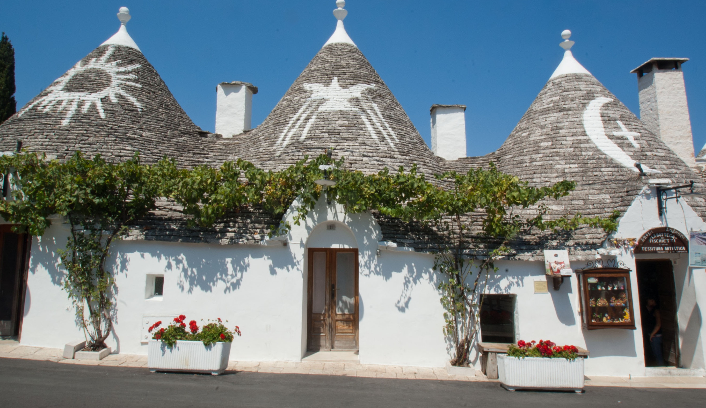 Picturesque Alberobello, Cultural landmarks, Stunning architecture, 2930x1690 HD Desktop