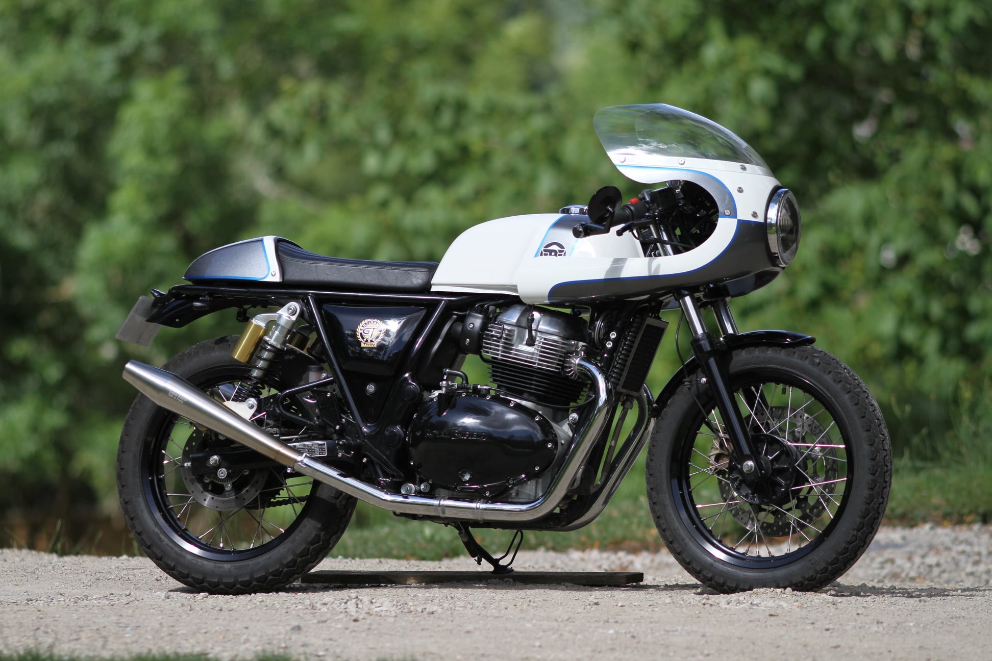 Royal Enfield Continental GT 650, Cafe racer front fairing, Lush green forest background, HD Desktop wallpaper