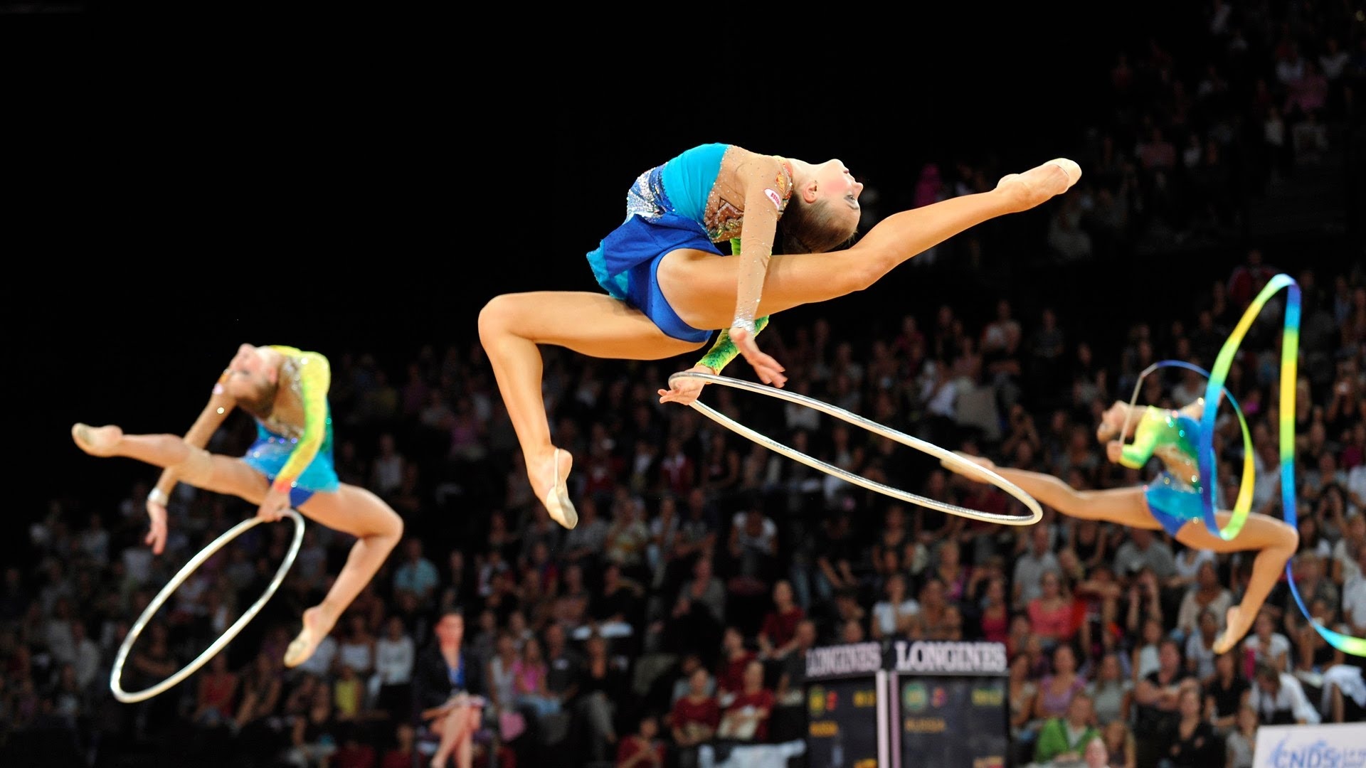 Dynamic gymnastics poses, Powerful movements, Athletic achievements, Sports wallpaper, 1920x1080 Full HD Desktop