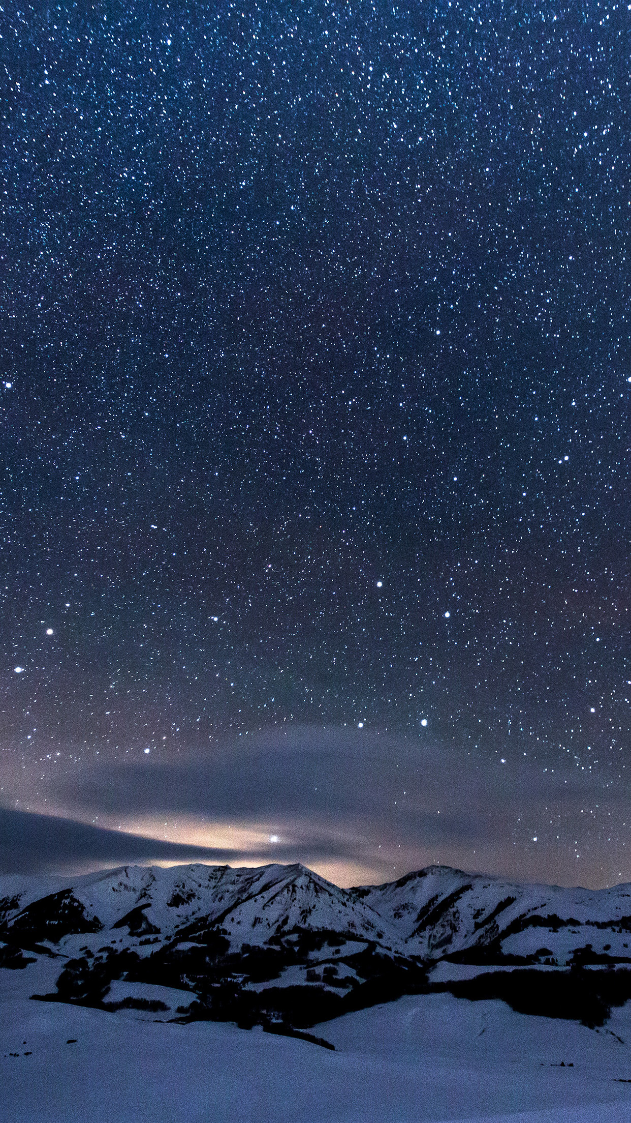 star-filled night sky, snow-covered mountain range, glowing horizon clouds, HD Phone wallpaper