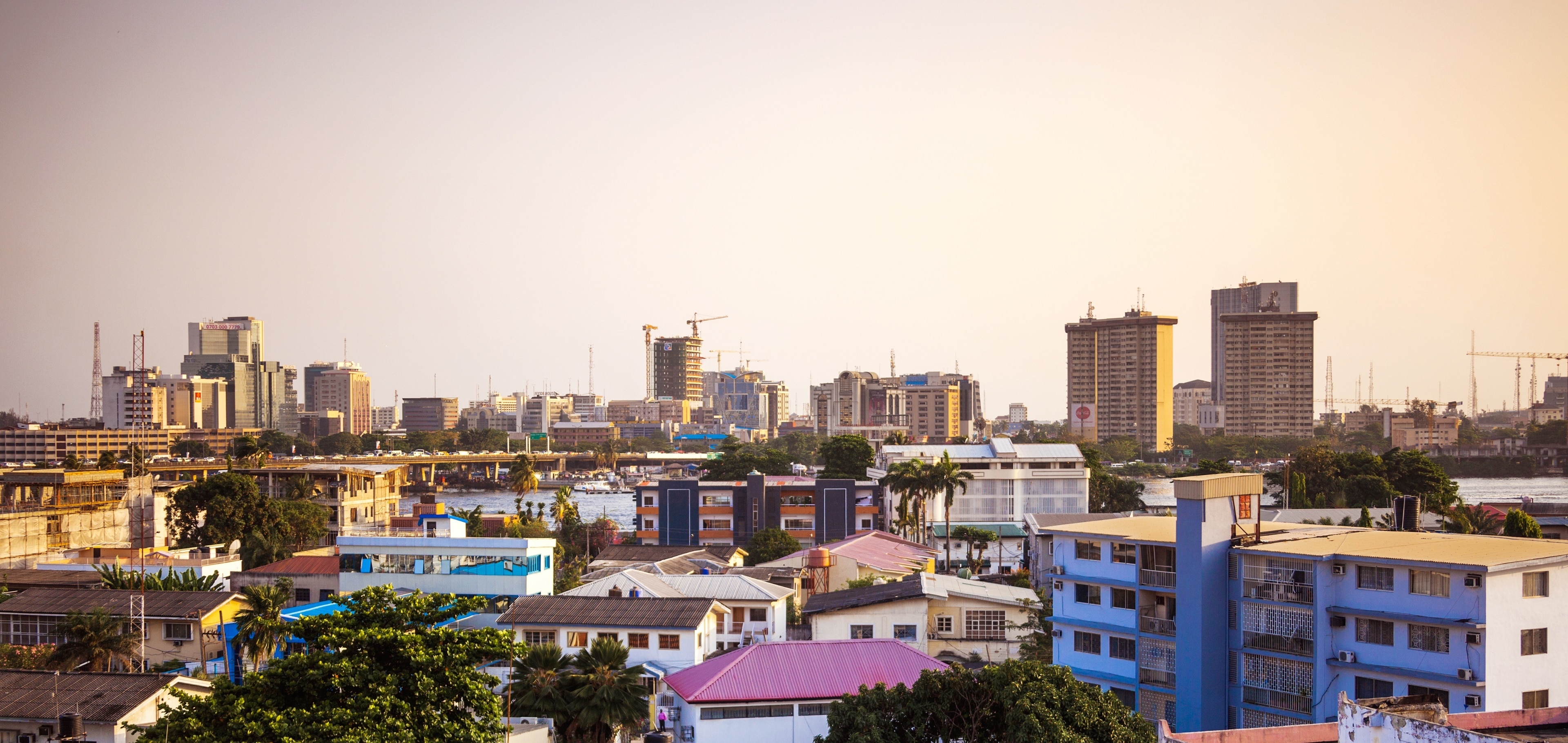 Lagos travels, Reisetipps Lagos, Vibrant city life, Cultural diversity, 3840x1820 Dual Screen Desktop