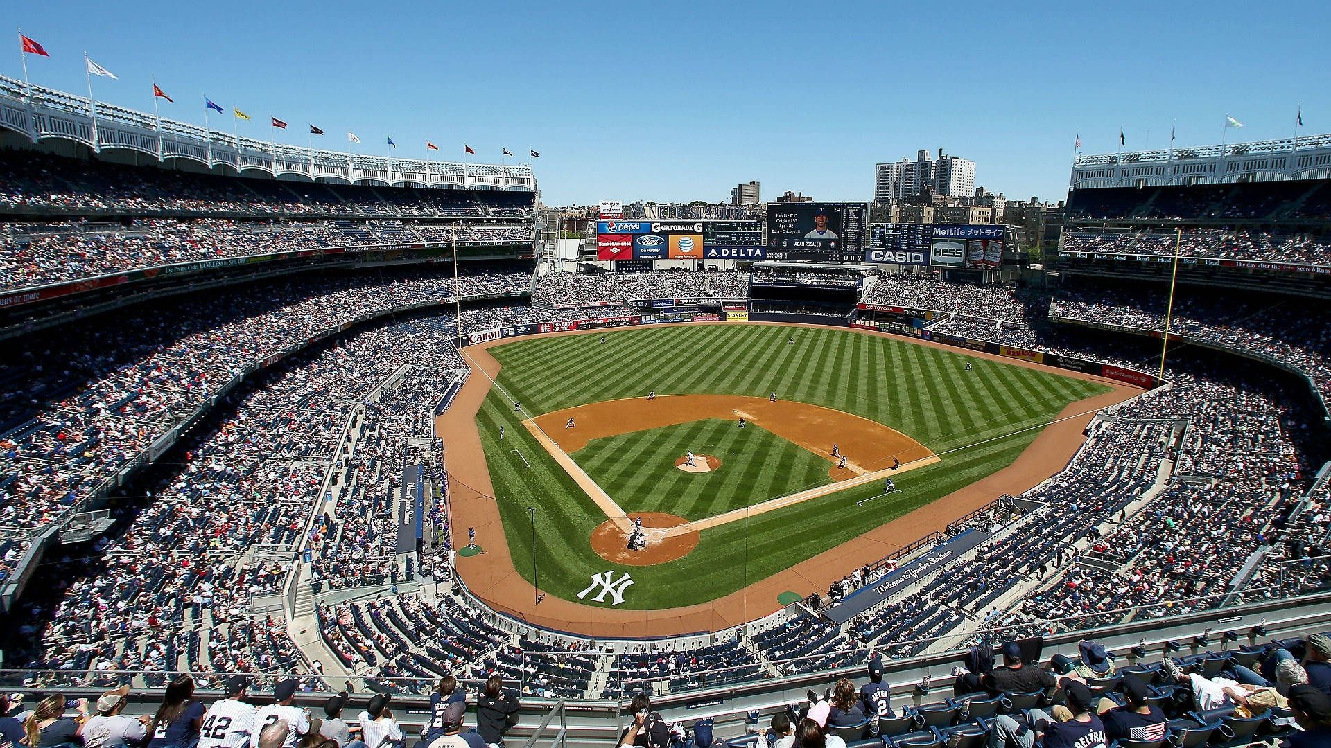 Yankees neon sign, Vibrant team spirit, Electric blue hues, Night-time sports, Gleaming stadium, 1920x1080 Full HD Desktop