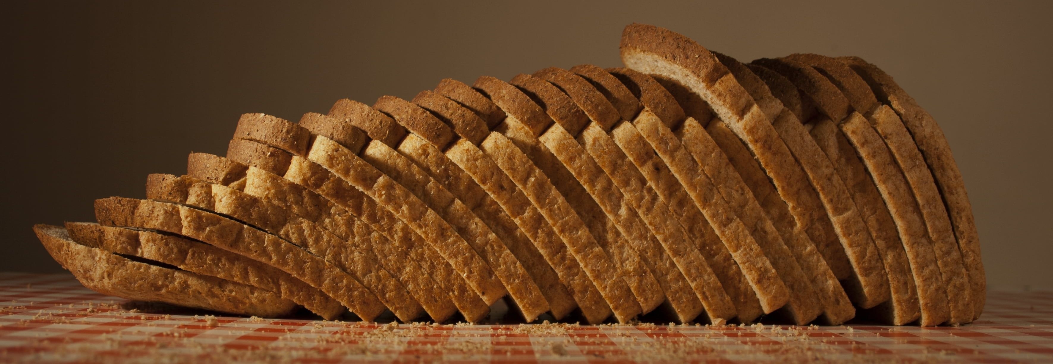 Assorted bread varieties, Mouthwatering visuals, Rustic charm, Irresistible flavors, 3550x1230 Dual Screen Desktop