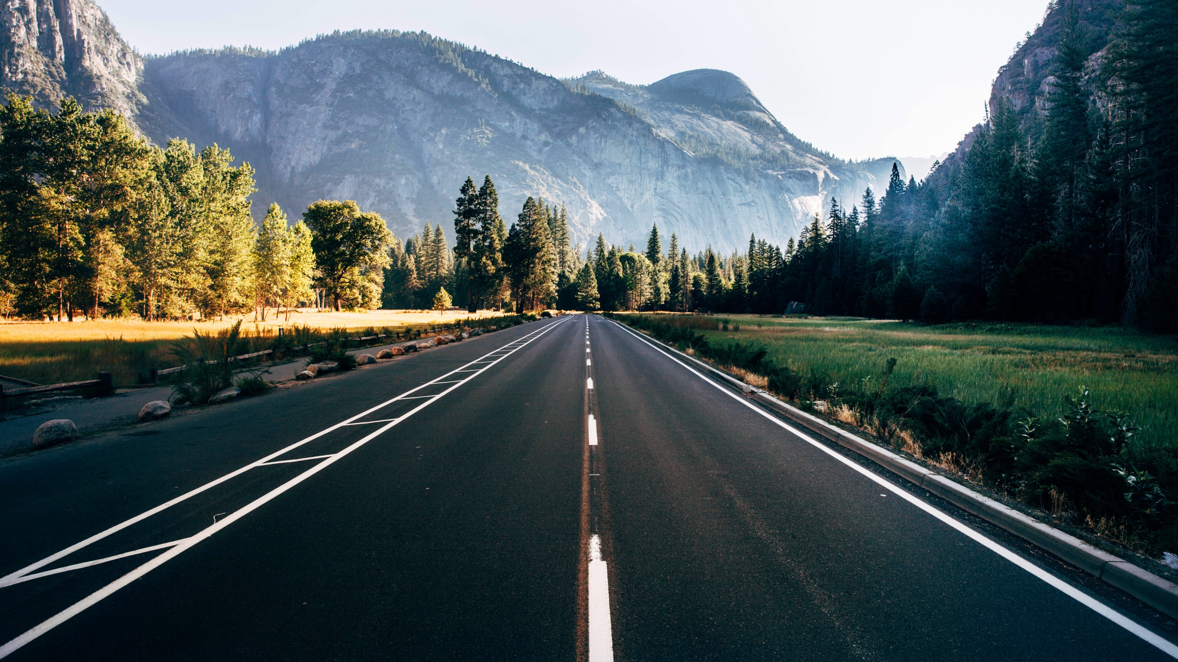 Yosemite Valley, straight asphalt road, granite mountain cliffs, 4K Desktop wallpaper