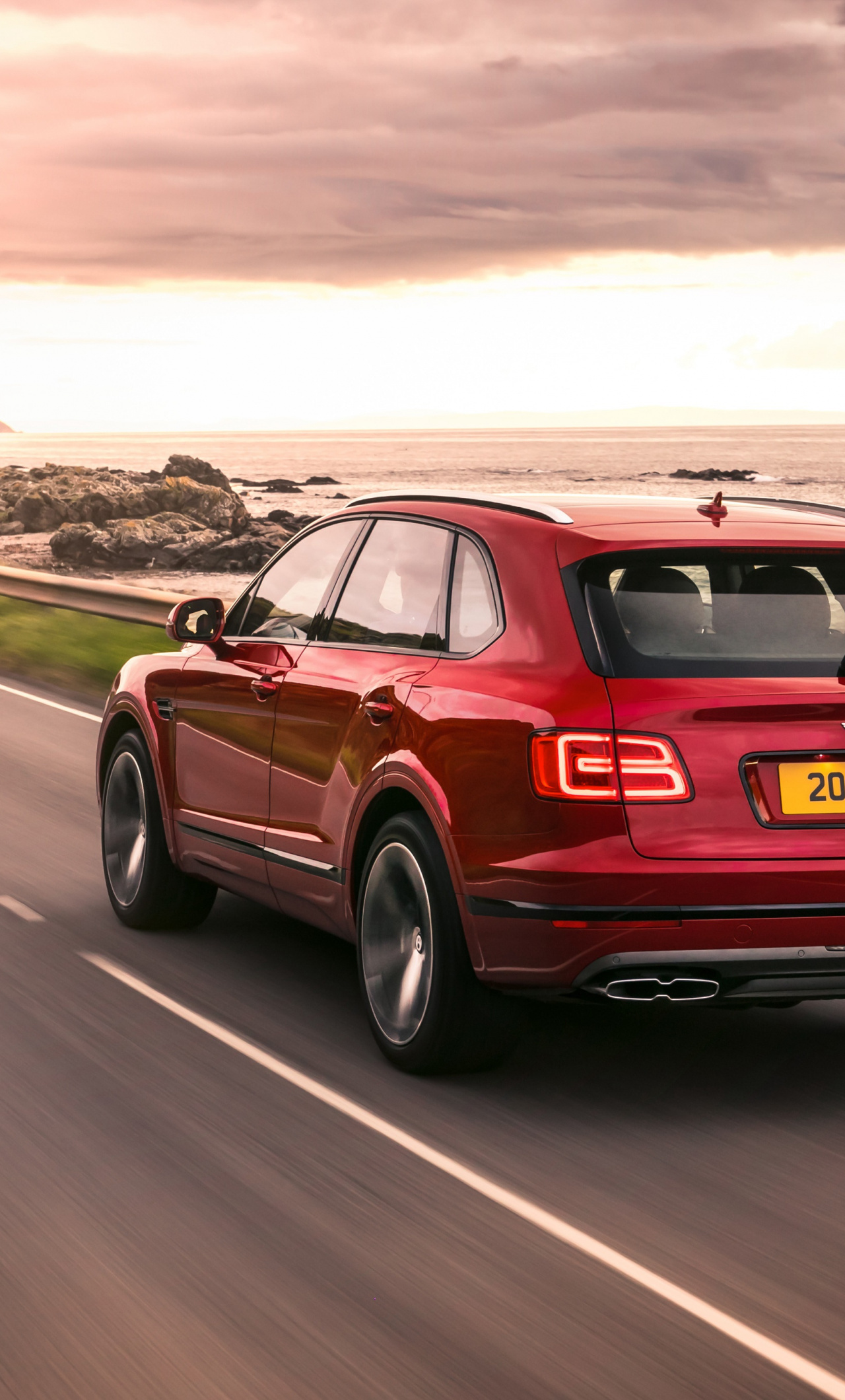Bentley Bentayga, Red on road, Sports utility vehicle, Luxurious design, 1280x2120 HD Phone