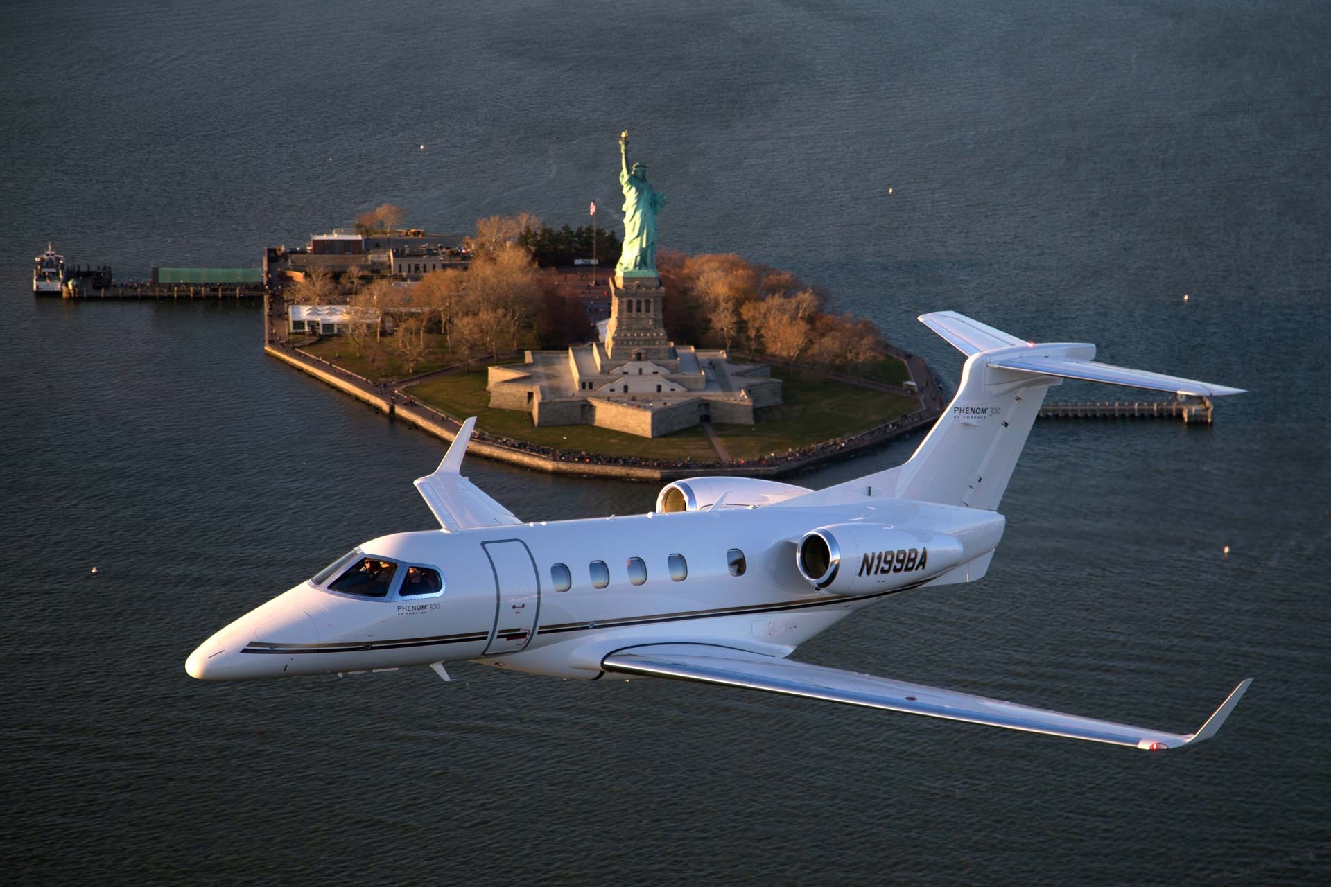 Embraer Phenom, New York City, Statue of Liberty, Creative storytelling, 1920x1280 HD Desktop