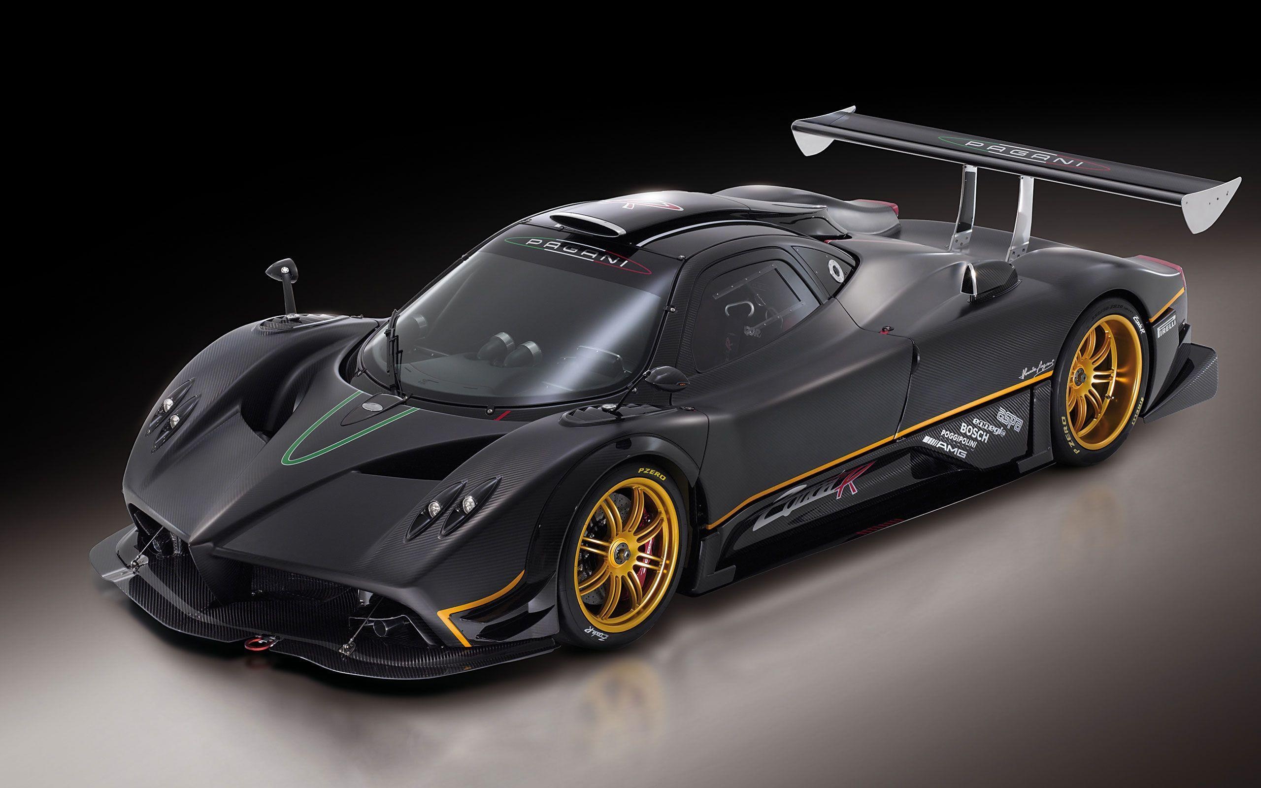 Pagani Zonda R, exposed carbon fiber body, gold multispoke wheels, HD Desktop wallpaper