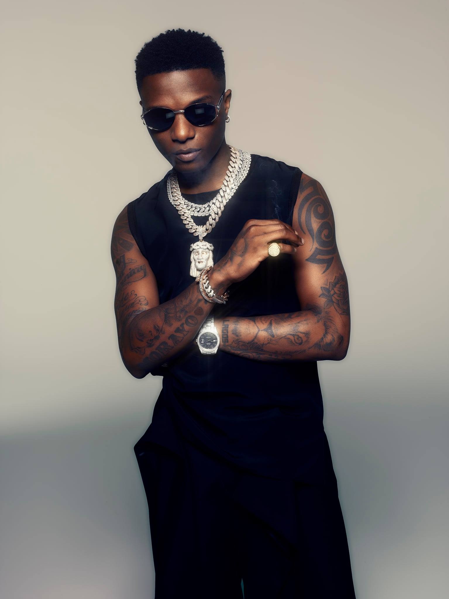 Wizkid MIL album, Brit certified silver, 1540x2050 HD Phone