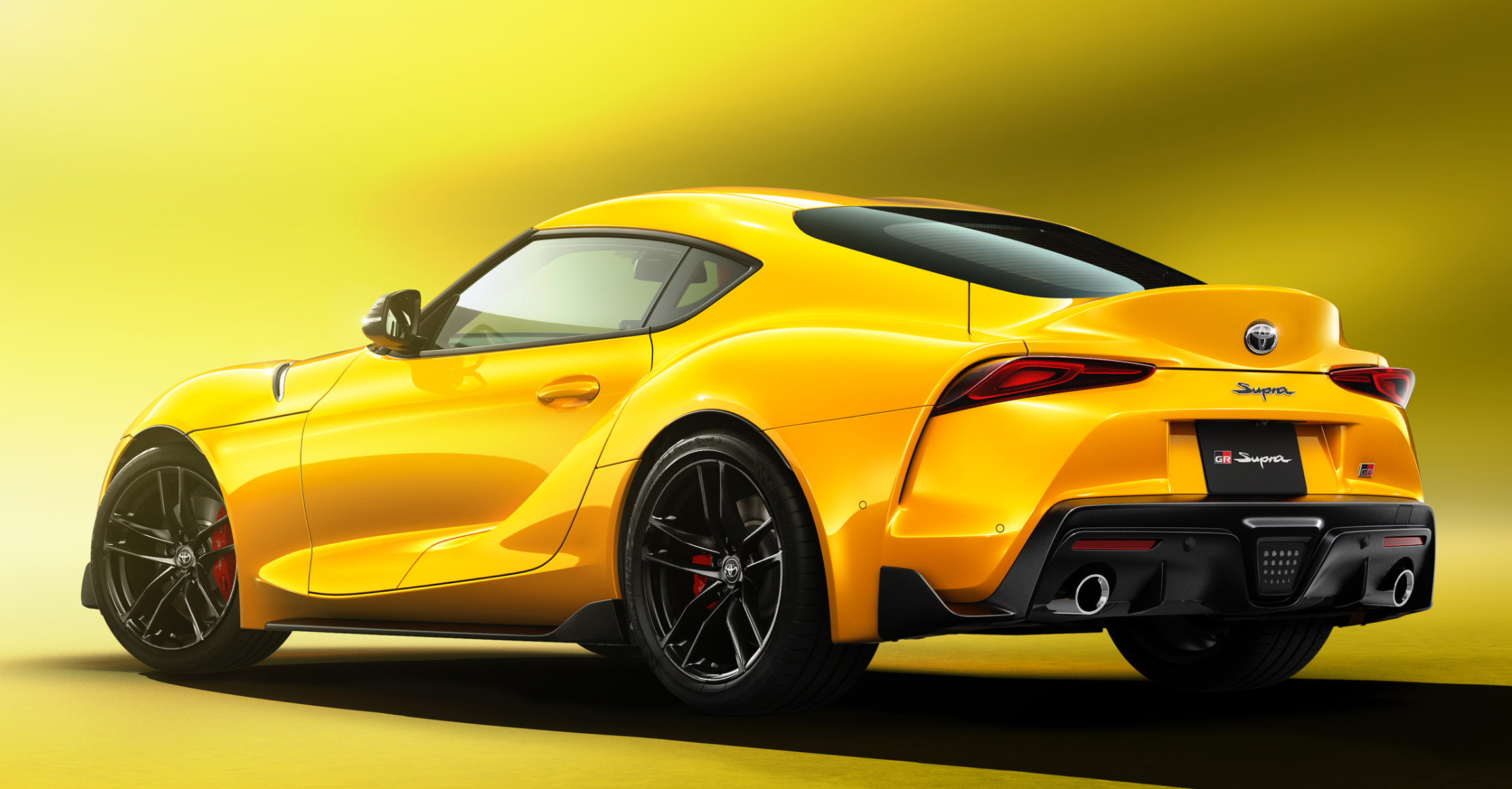 Toyota GR Supra, Racing prowess, Iconic sports car, 2300x1200 HD Desktop