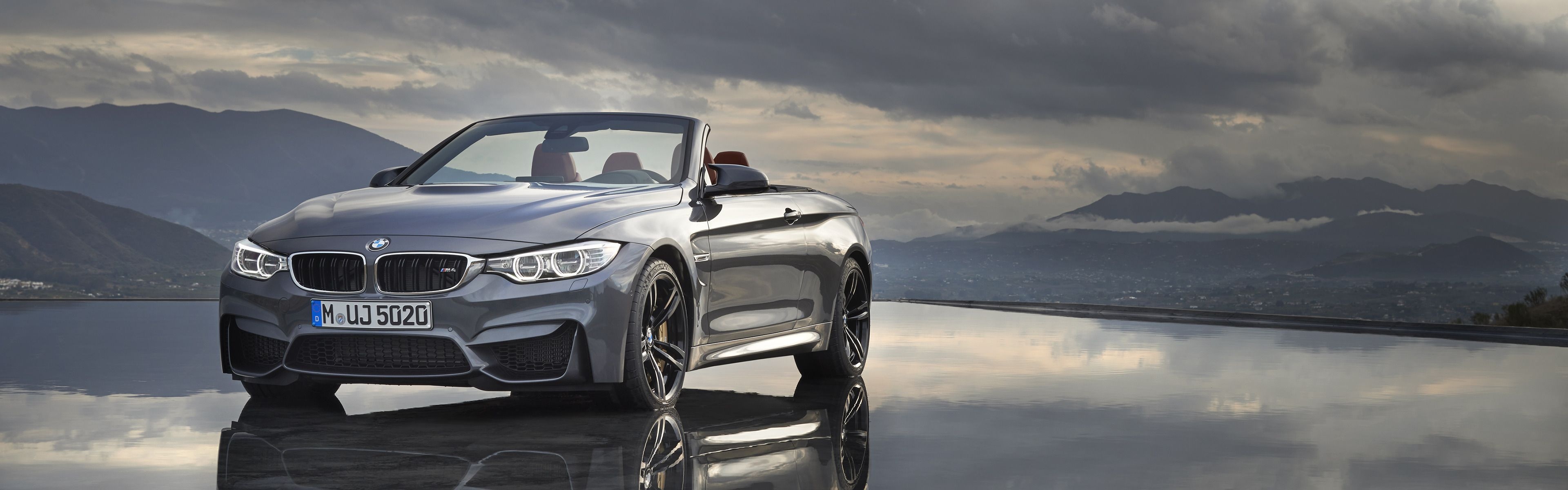 BMW M4 Convertible, Wet reflective pavement, Misty mountain landscape, Dual Screen Desktop wallpaper