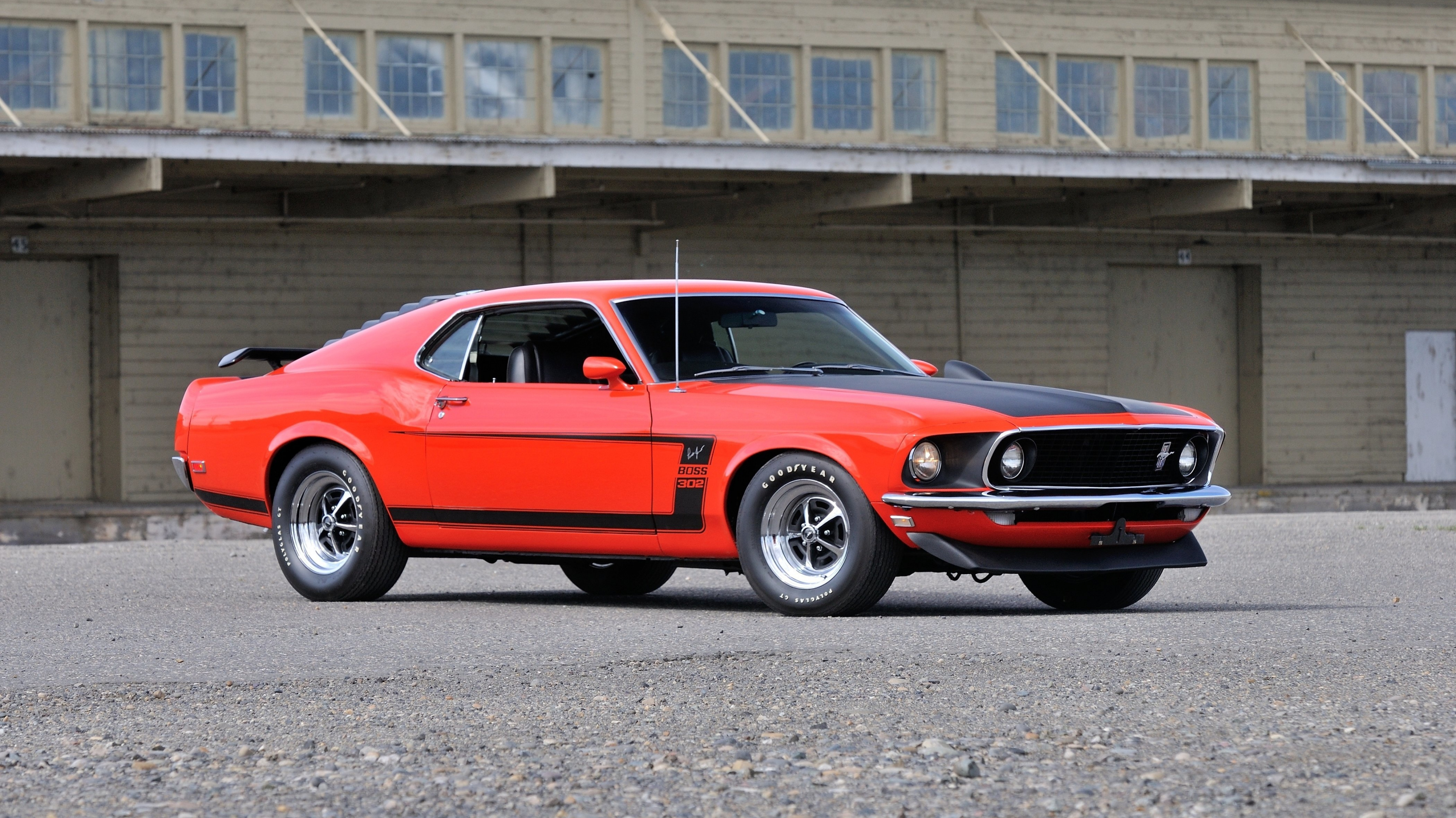 1969 Ford Mustang Boss 302, Goodyear Polyglas GT tires, Industrial airfield hangar, 4K Desktop wallpaper