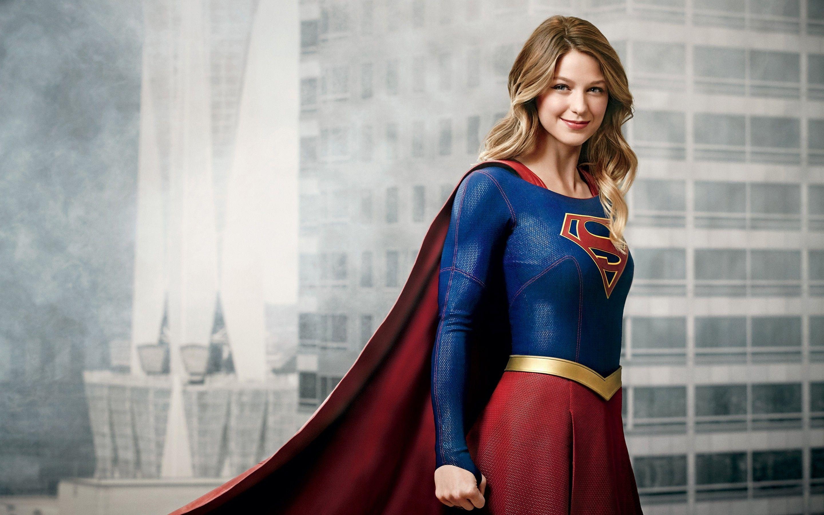 Melissa Benoist as Supergirl, House of El emblem, National City skyscraper backdrop, HD Desktop wallpaper