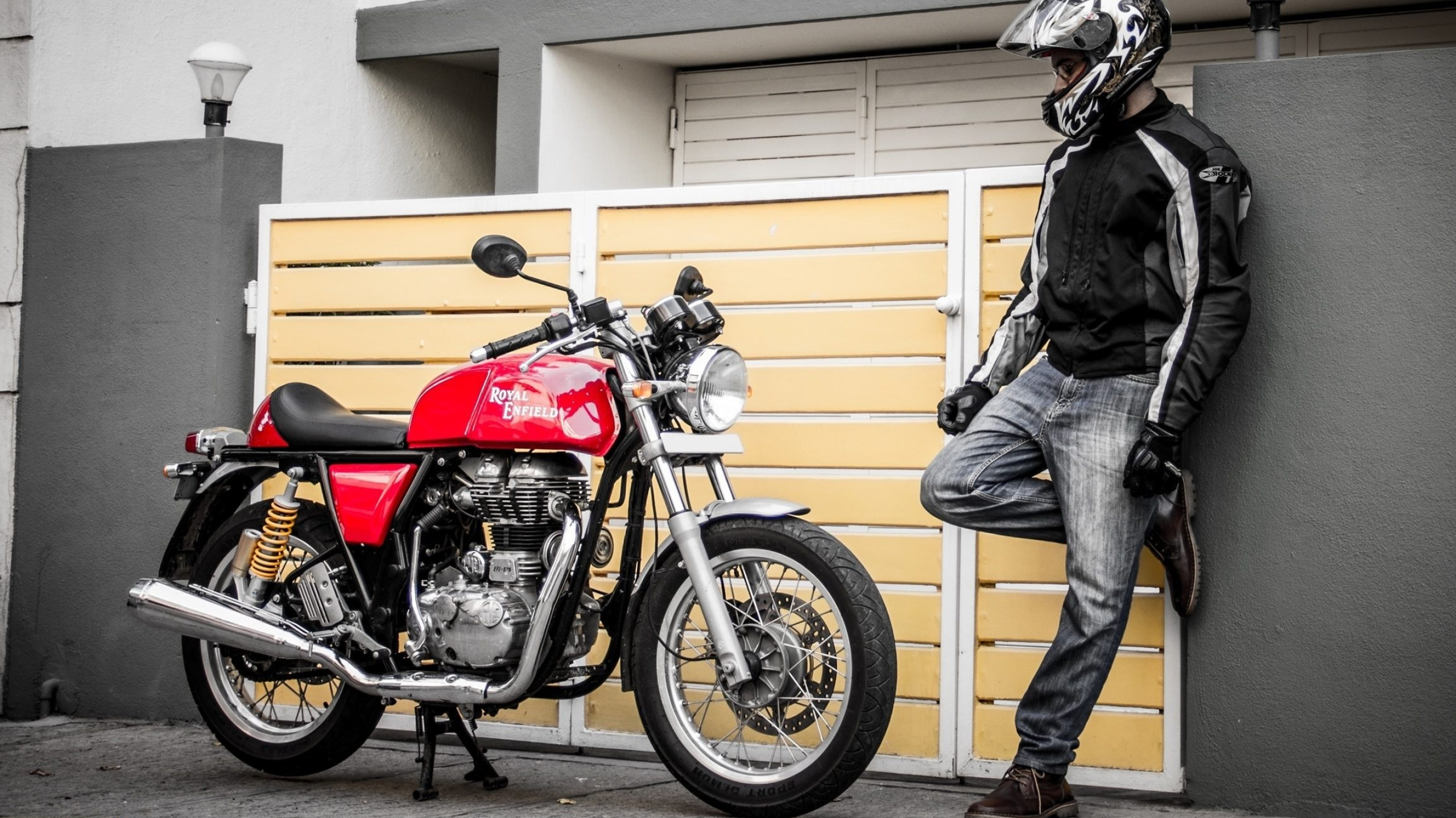 Royal Enfield Continental GT 535, Motorcyclist wearing riding gear, Yellow slatted gate, HD Desktop wallpaper