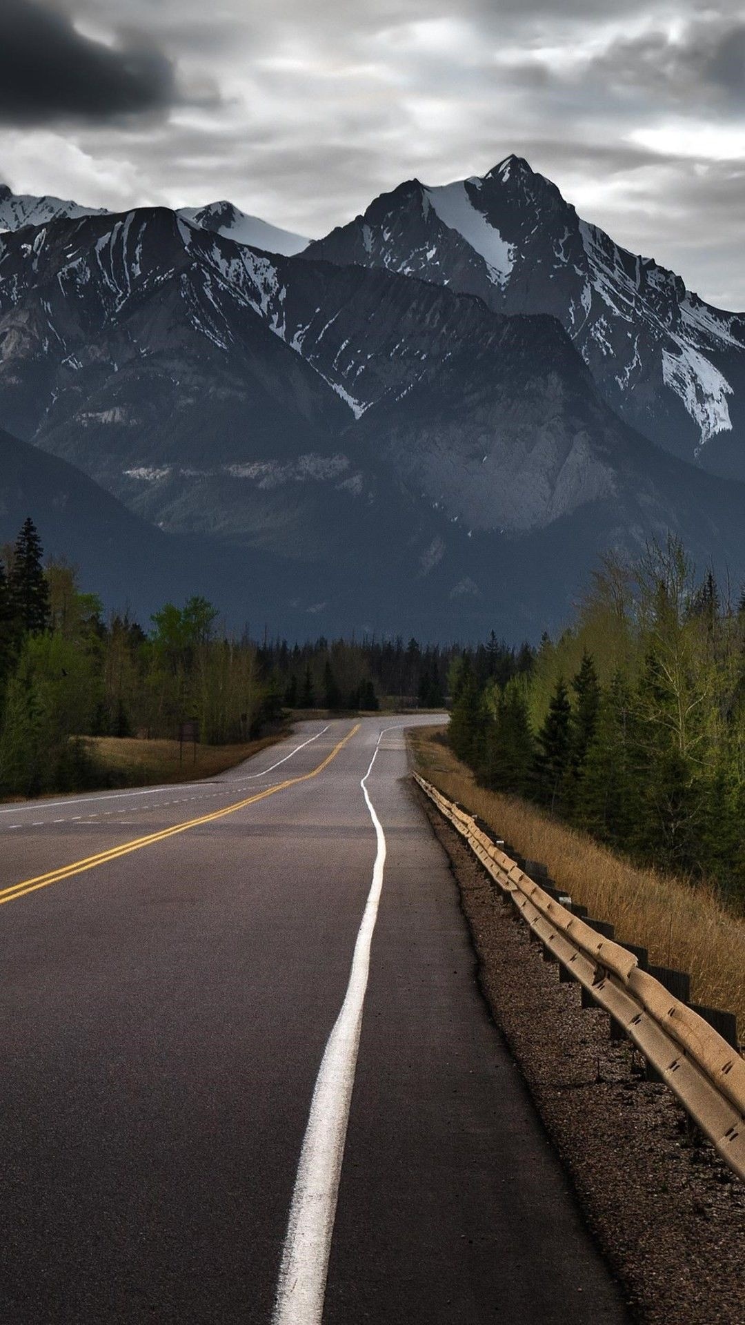 snow-capped mountain peak, curving two-lane highway, roadside metal guardrail, Full HD Phone wallpaper