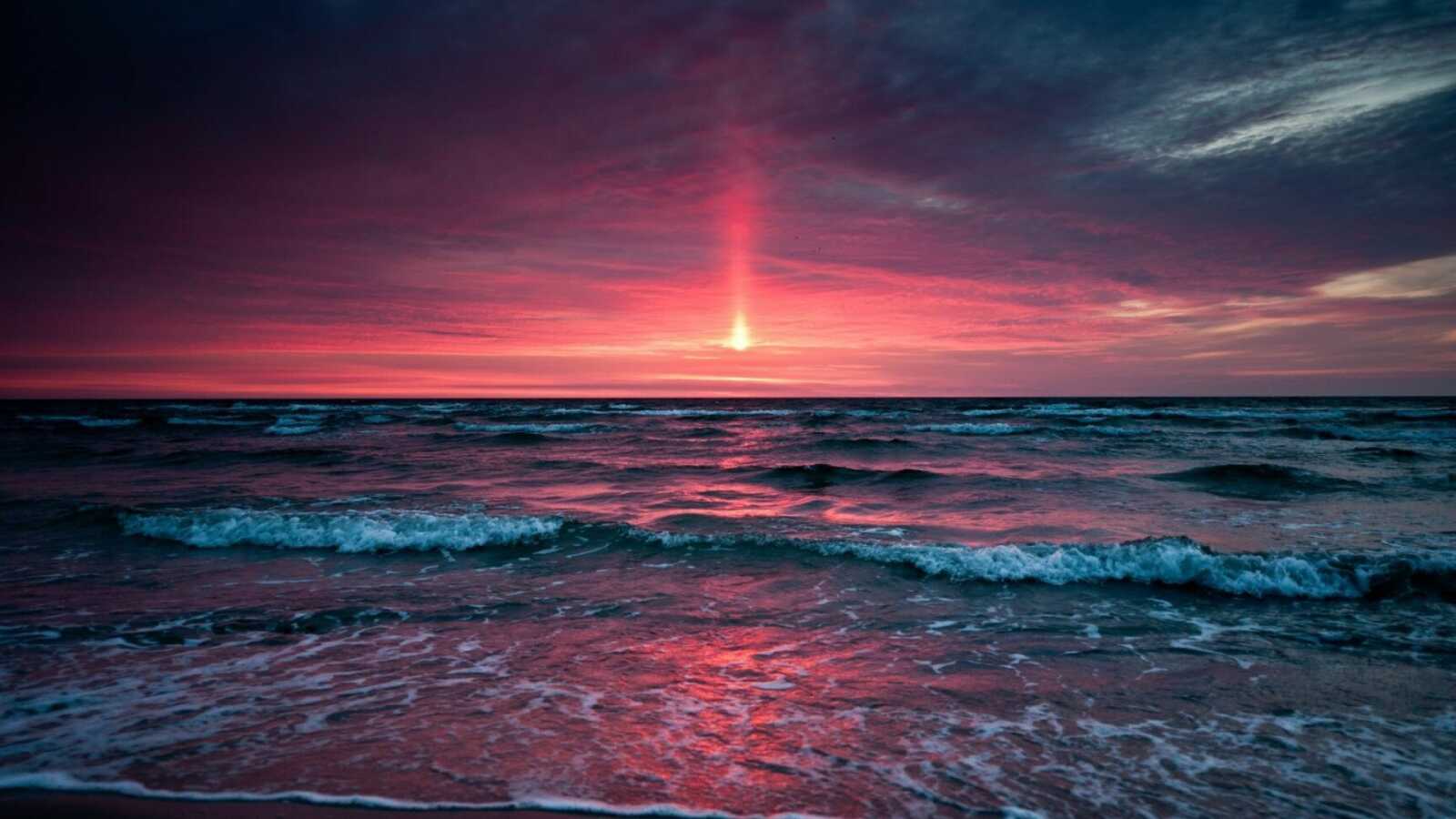 Sun Pillar Over Ocean