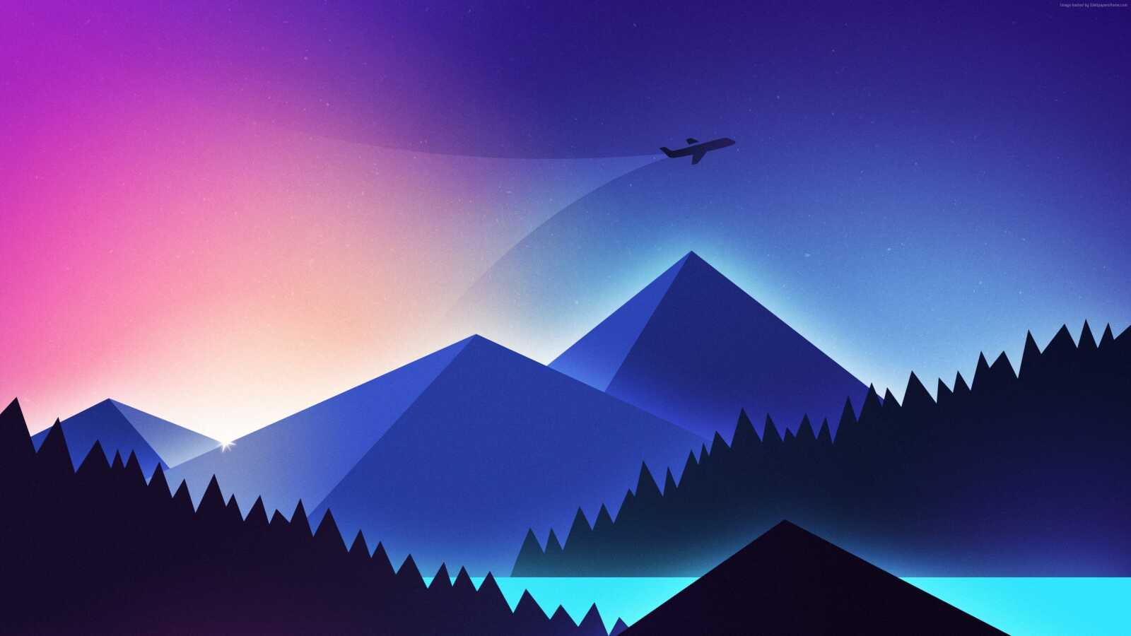 Airplane Over Layered Mountains